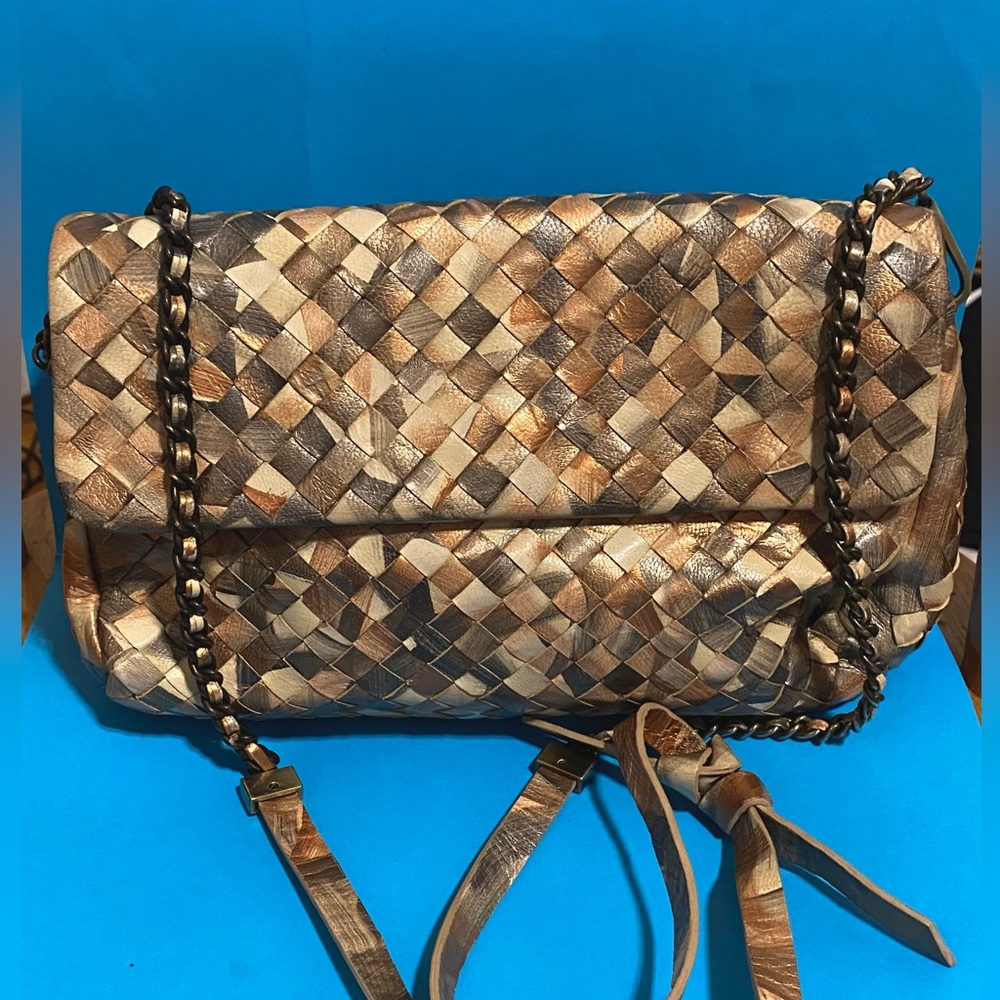 Leather cross body braided leather earth tone bag by Calonge